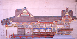 写真：紙に天満宮社殿の完成予想図が書き起こされている