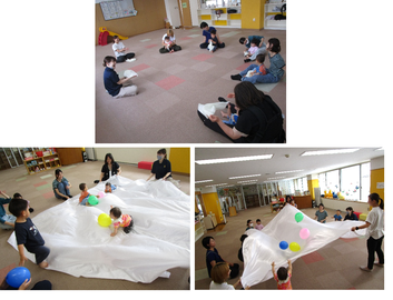 写真:布で遊んでいる様子